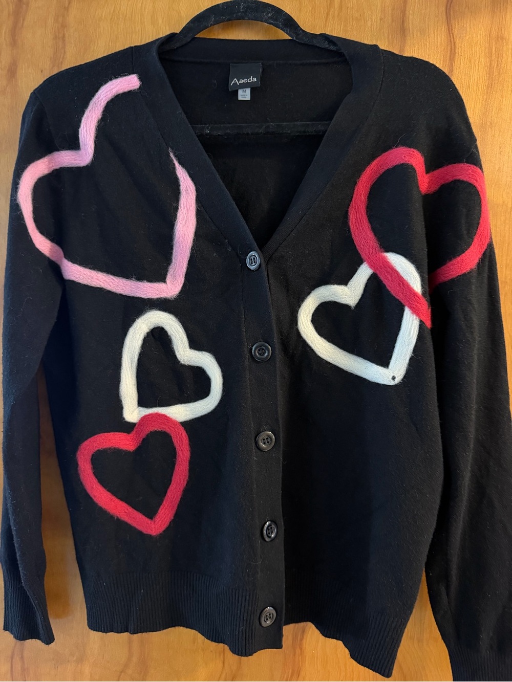 AVEDA Black Cardigan with Pink, Red & White Heart Motifs